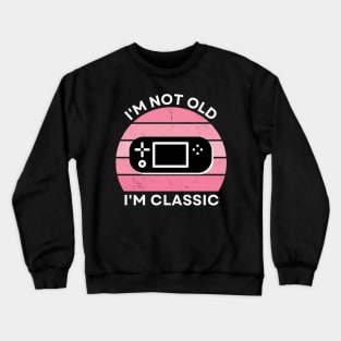 I'm not old, I'm Classic | Handheld Console | Retro Hardware | Vintage Sunset | Gamer girl | '80s '90s Video Gaming Crewneck Sweatshirt